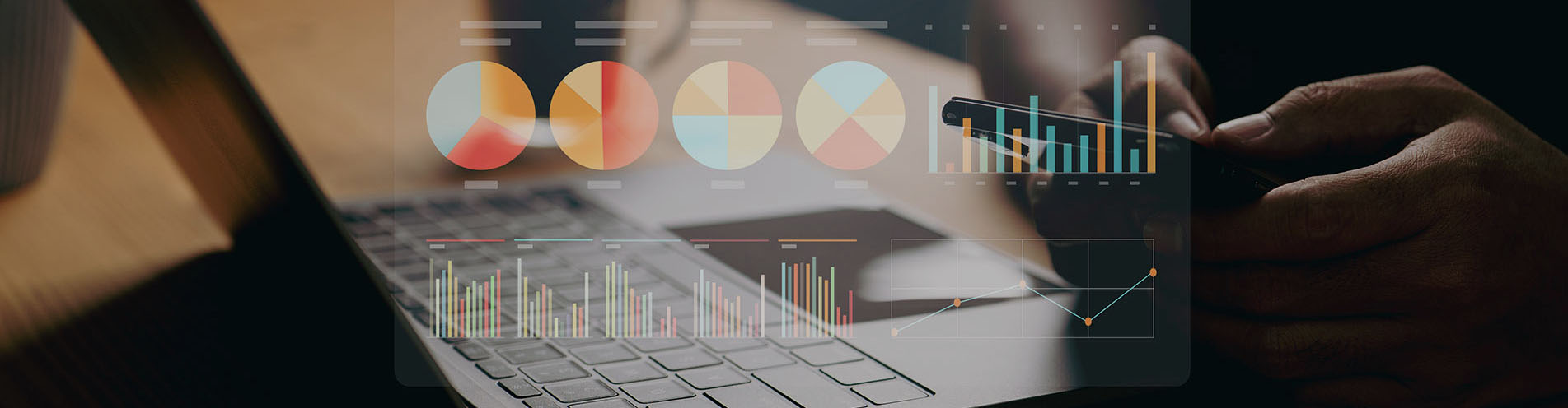 Colorful charts and graphs are overlaid on a closeup photo of a laptop computer being utilized by a person.